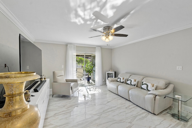 living room with ceiling fan and ornamental molding