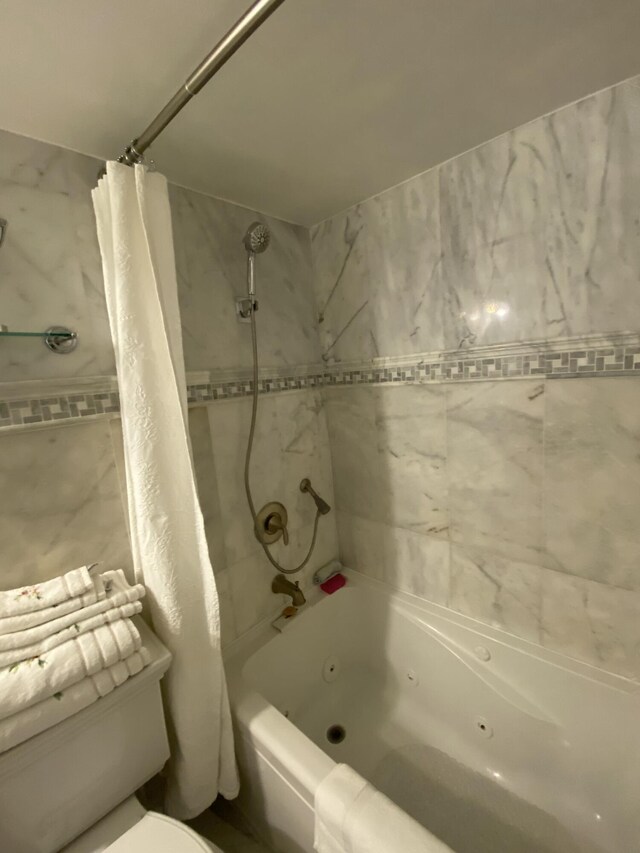 1100 NW 13th St Unit 292D, Boca Raton, FL 33486 - bedroom featuring light marble finish flooring, ornamental molding, a ceiling fan, and multiple closets
