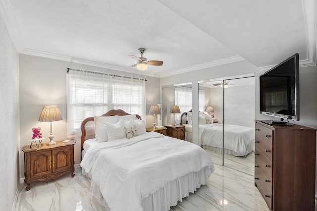 bedroom featuring ceiling fan and crown molding