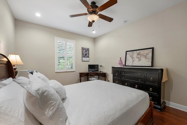 bedroom with ceiling fan and dark wood-type flooring