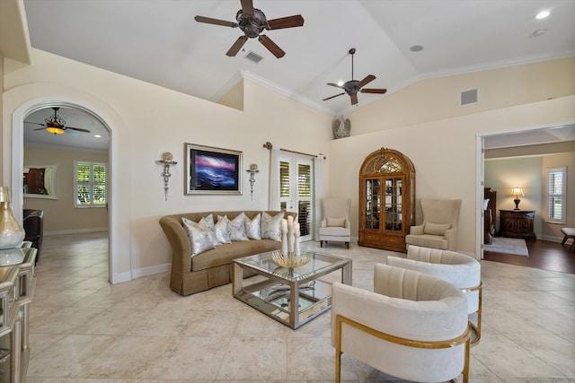 living room featuring a wealth of natural light, lofted ceiling, ceiling fan, and crown molding