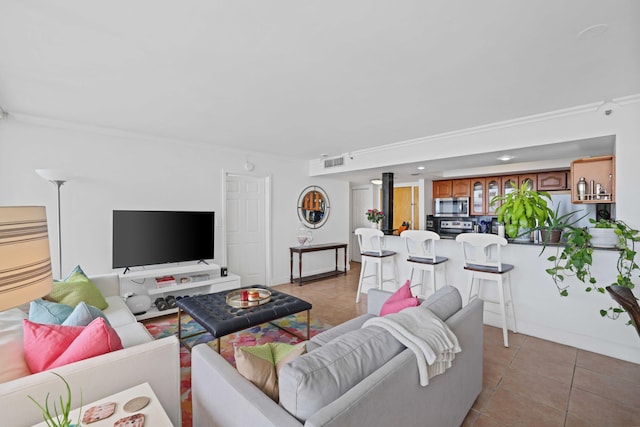 tiled living room with crown molding