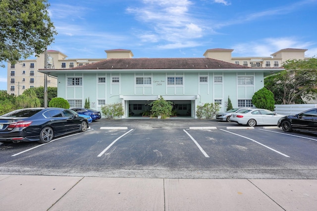 view of parking featuring a garage