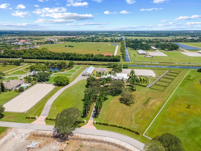 drone / aerial view with a rural view and a water view