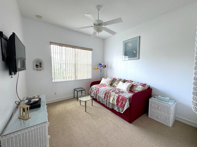 bedroom featuring ceiling fan and carpet flooring