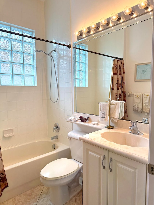 full bathroom with tile patterned flooring, vanity, toilet, and shower / bath combo