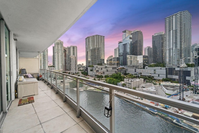 balcony at dusk with a water view