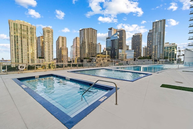 view of swimming pool featuring a patio