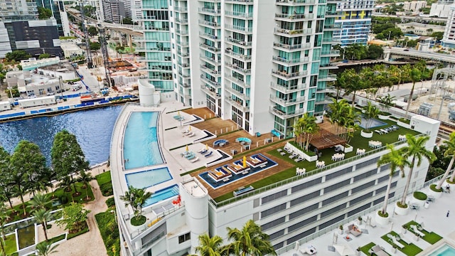 birds eye view of property featuring a water view