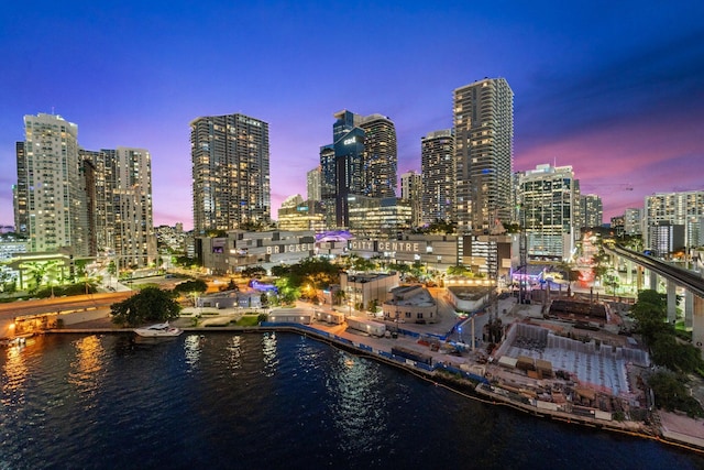 property's view of city featuring a water view