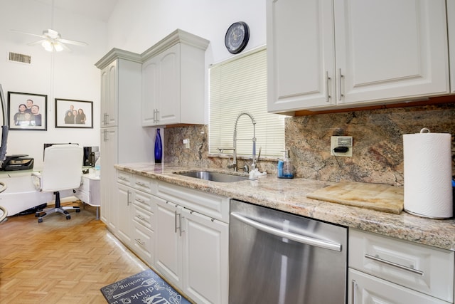 kitchen with white cabinetry, dishwasher, sink, tasteful backsplash, and light parquet flooring