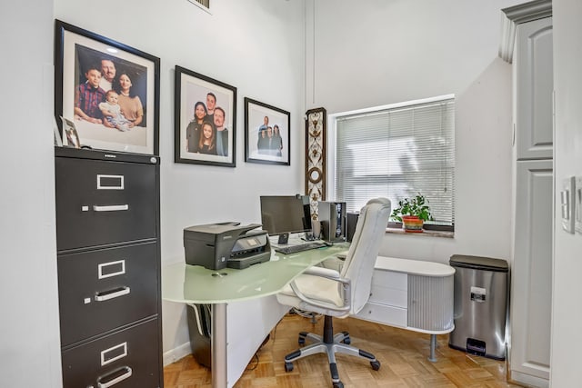 home office with light parquet floors