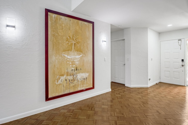 corridor with dark parquet floors