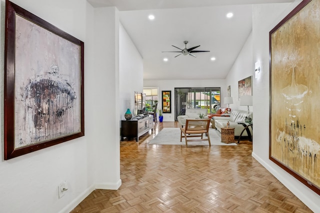 hall featuring high vaulted ceiling and light parquet floors