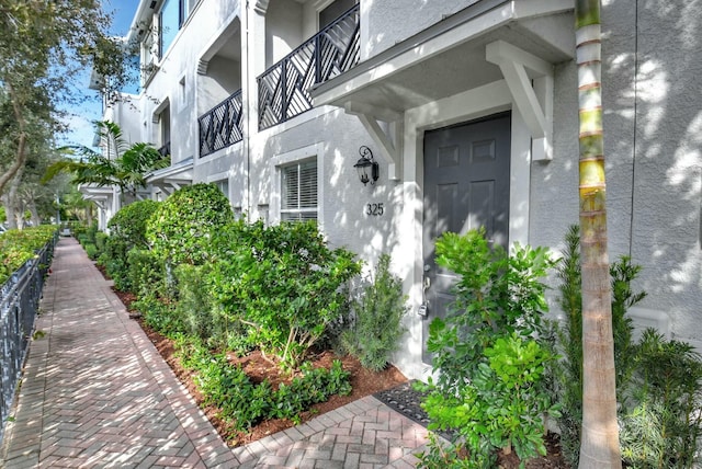 doorway to property with a balcony