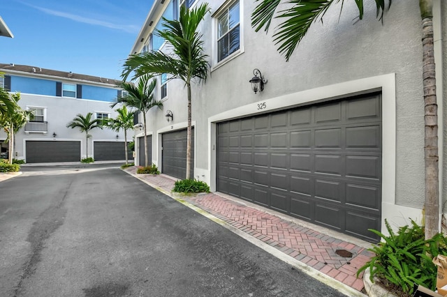 exterior space with a garage