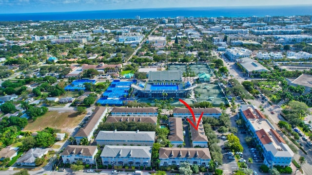 birds eye view of property featuring a water view