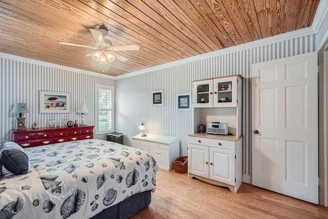 bedroom featuring light hardwood / wood-style floors, ceiling fan, ornamental molding, and wood ceiling