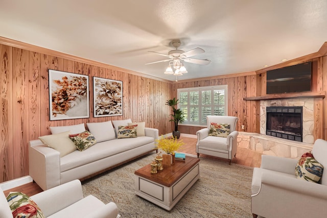 bedroom with ceiling fan, light hardwood / wood-style flooring, and ornamental molding