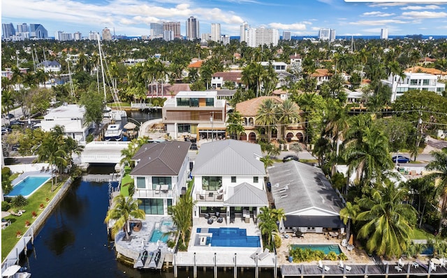 aerial view featuring a water view and a city view