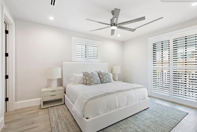 bedroom with ceiling fan, baseboards, light wood finished floors, and recessed lighting