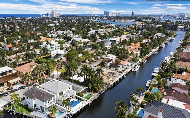 aerial view featuring a city view and a water view