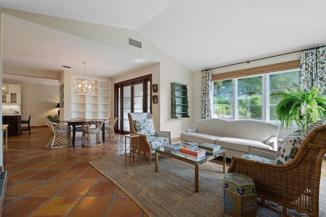 tiled living room with lofted ceiling and an inviting chandelier