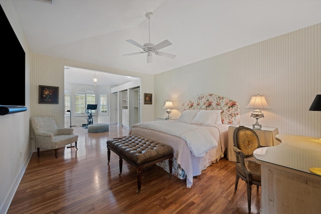 bedroom with lofted ceiling, ceiling fan, and hardwood / wood-style floors