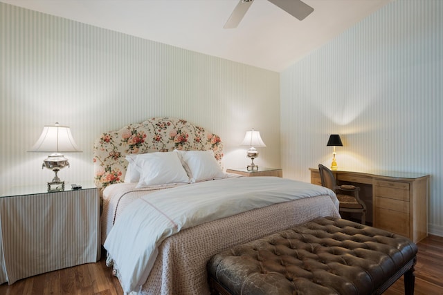 bedroom featuring dark hardwood / wood-style flooring and ceiling fan