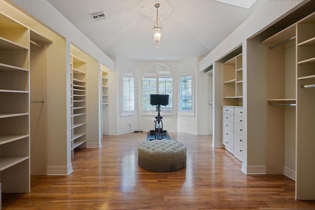 unfurnished room featuring wood-type flooring