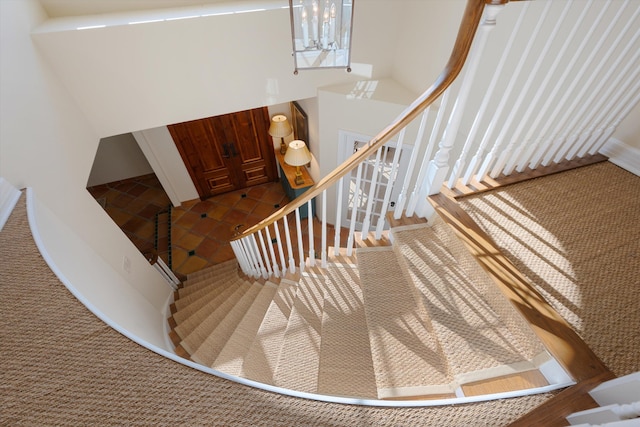 stairs with tile patterned flooring