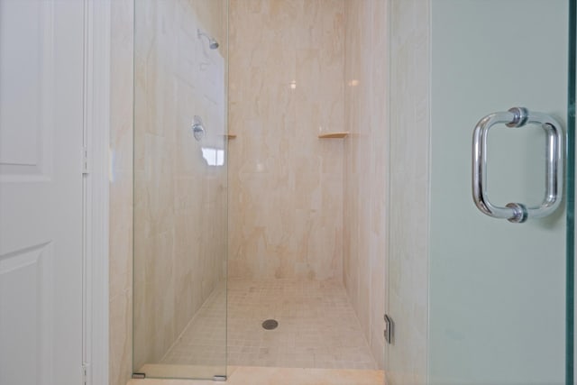 bathroom featuring an enclosed shower