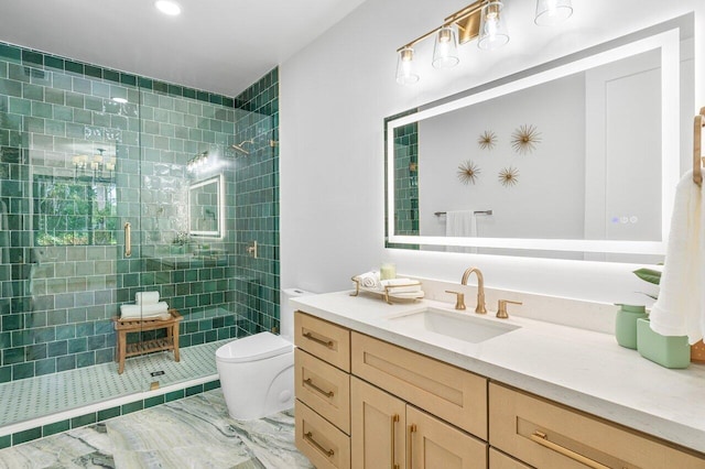 bathroom featuring vanity, toilet, and an enclosed shower