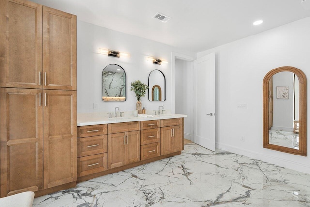 16436 Bridlewood Cir E, Delray Beach, FL 33445 - bathroom with marble tiled floors, double vanity, and recessed lighting