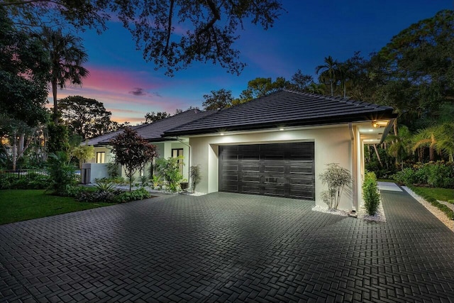 view of front of home with a garage