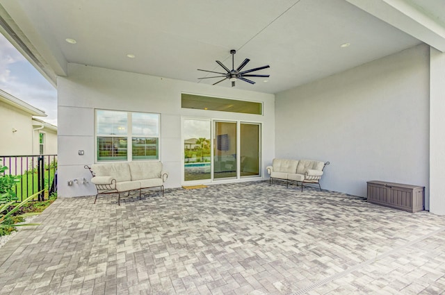 view of patio / terrace featuring an outdoor living space and ceiling fan