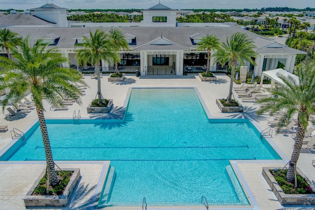 view of swimming pool with a patio