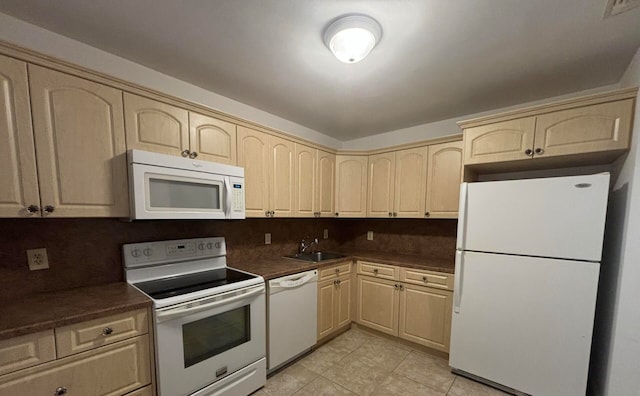 kitchen with light brown cabinets, backsplash, and white appliances