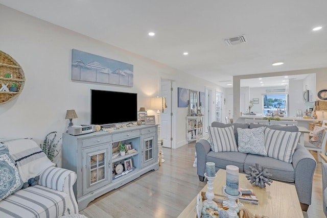 living room with light wood-type flooring