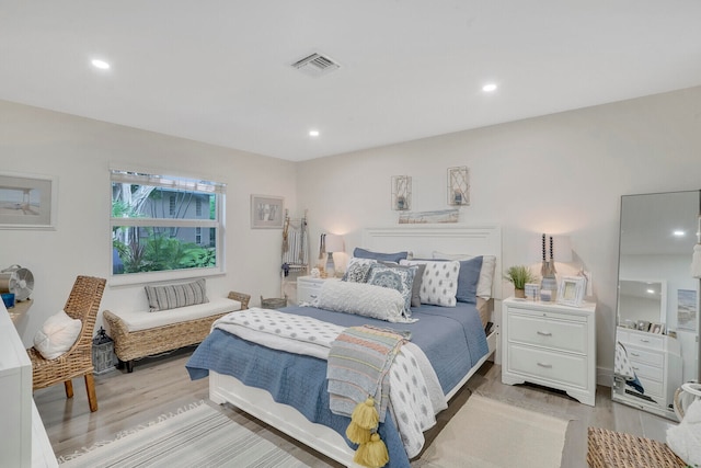 bedroom featuring light hardwood / wood-style flooring