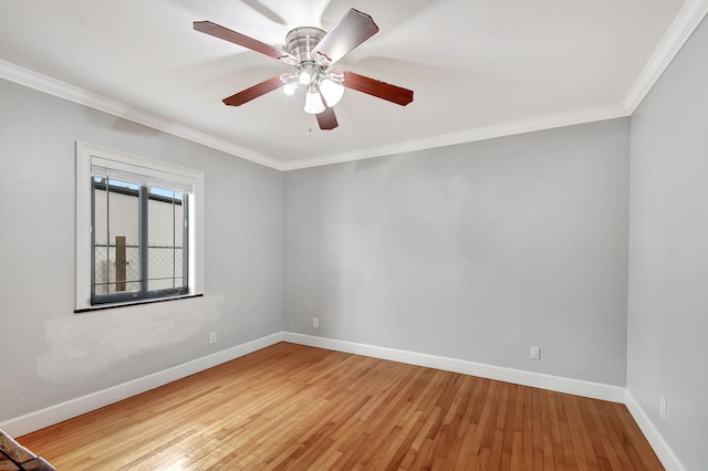 504 51st St, West Palm Beach, FL 33407 - unfurnished room featuring wood-type flooring, baseboards, crown molding, and ceiling fan
