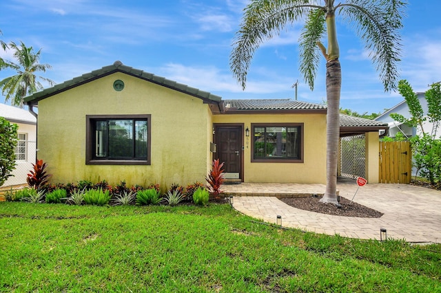 view of front of house with a front lawn