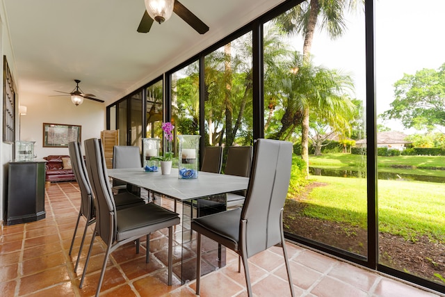 sunroom / solarium with ceiling fan