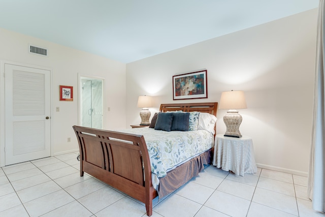 bedroom featuring light tile patterned floors