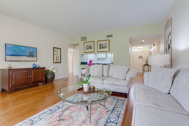 living room with hardwood / wood-style floors