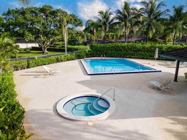 view of pool with a patio area