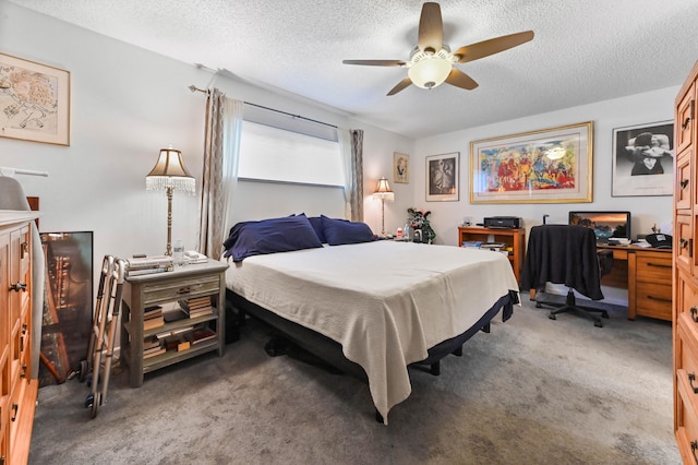 carpeted bedroom with ceiling fan and a textured ceiling