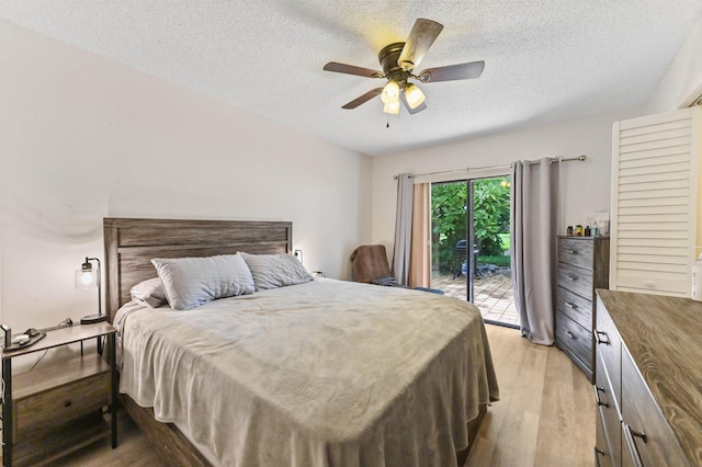 bedroom featuring a textured ceiling, access to exterior, ceiling fan, and light hardwood / wood-style floors