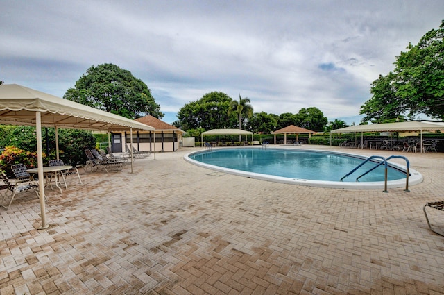 view of pool featuring a patio area and a gazebo