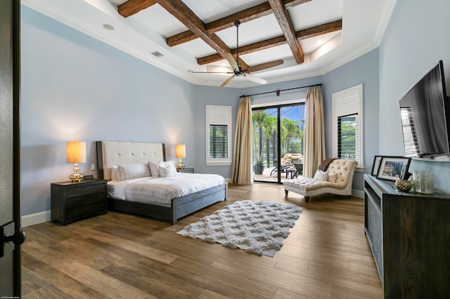 bedroom featuring ceiling fan, beam ceiling, dark wood-type flooring, coffered ceiling, and access to exterior